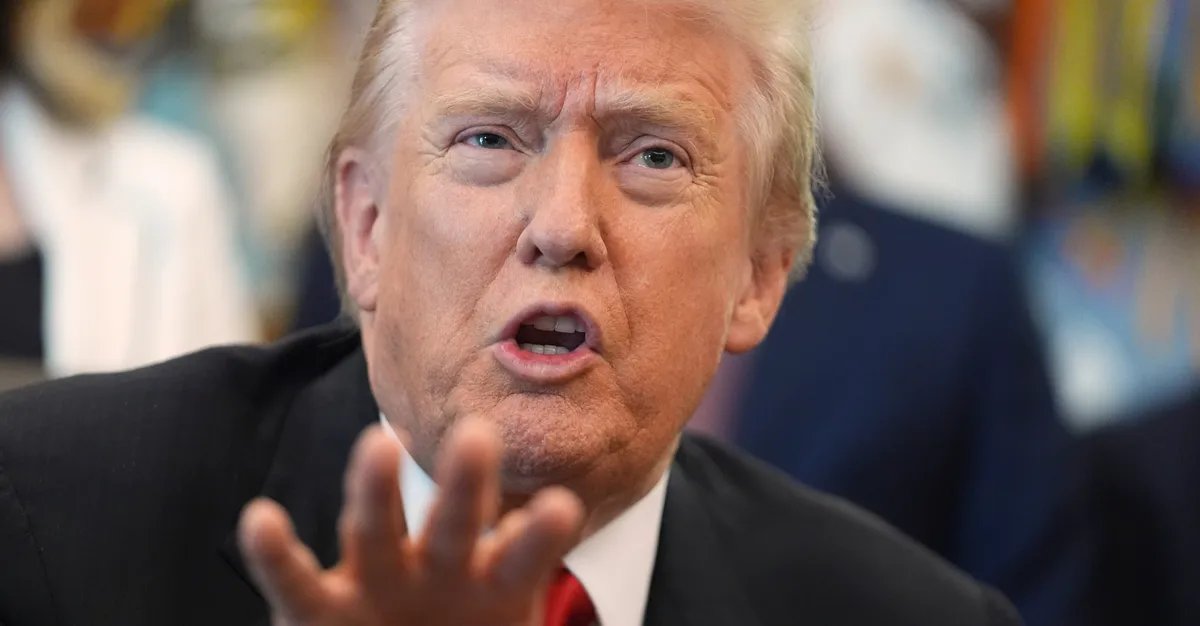 Donald Trump speaking at a rally, emphasizing his financial success.