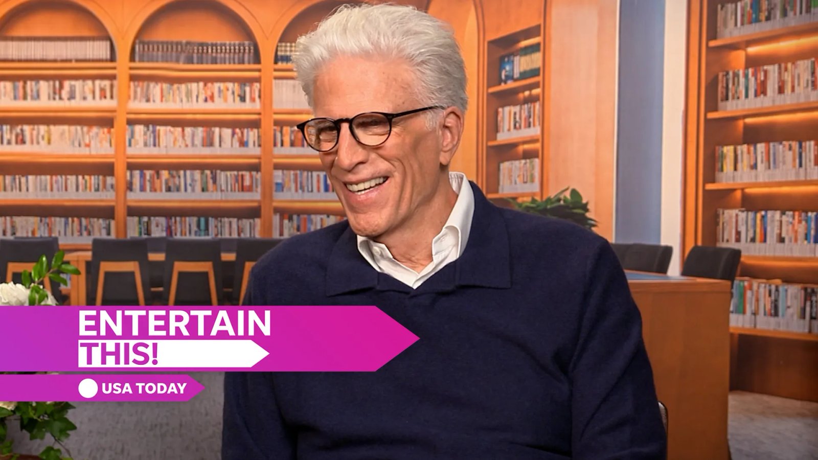 A candid shot of Ted Danson and Mary Steenburgen laughing together.