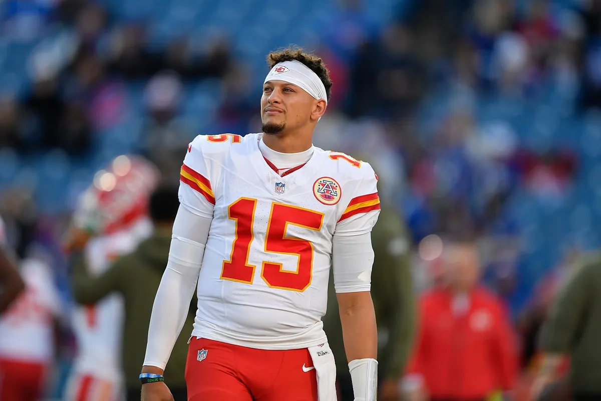 Patrick Mahomes Dejected: Chiefs Upset & NFL Controversial Call Backlash Patrick Mahomes looking dejected on the sidelines after a turnover during the controversial Chiefs upset game, sparking NFL backlash.