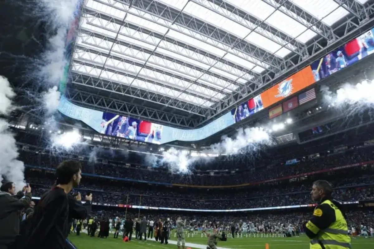 The Santiago Bernabeu stadium packed with NFL fans, showcasing the unprecedented attendance and excitement.