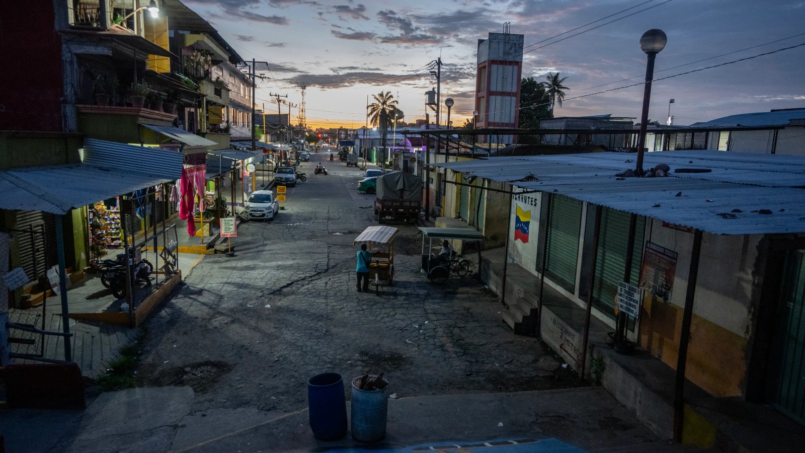 A busy street in Tapachula, southern Mexico, reflecting the usual patterns of a migrant transit hub, now showing signs of change.