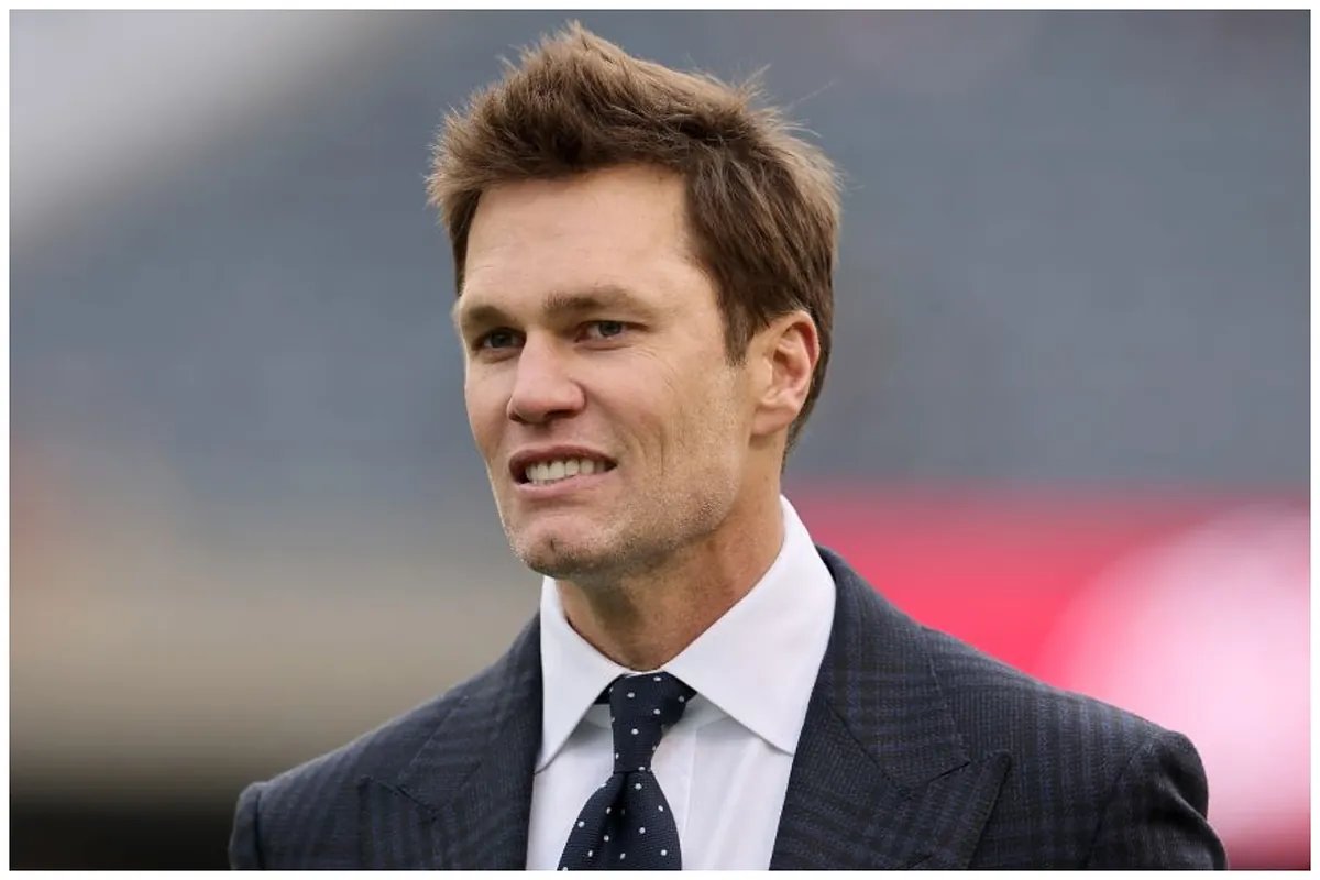 Tom Brady with Junie, his cloned dog, sparking controversy.