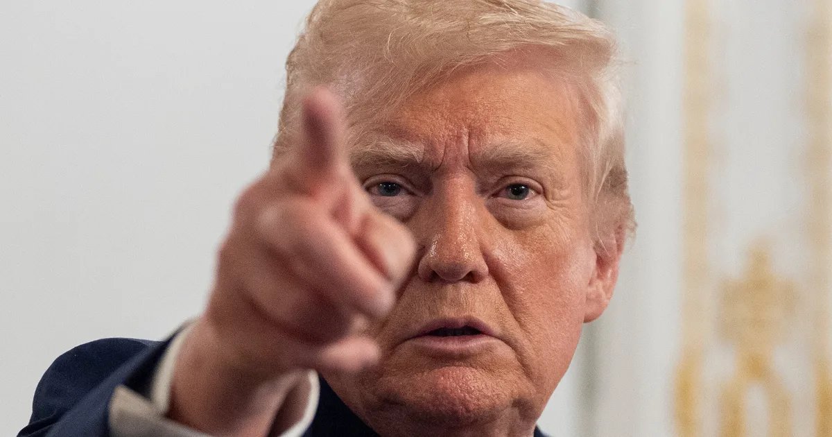 A control tower at an airport, with planes taking off and landing in the background.