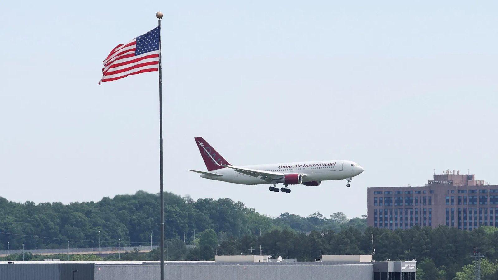 A closed door with the sign 'Immigration Services' on it, symbolizing the barriers refugees face.