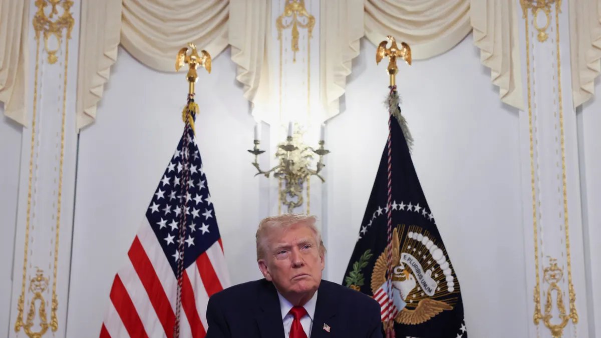 Donald Trump addressing reporters at Mar-a-Lago on Thanksgiving.