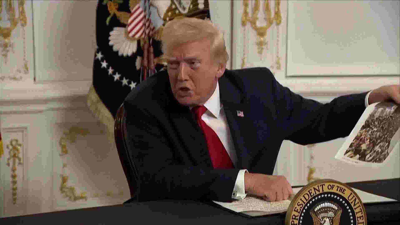 Donald Trump at a press conference addressing reporters.