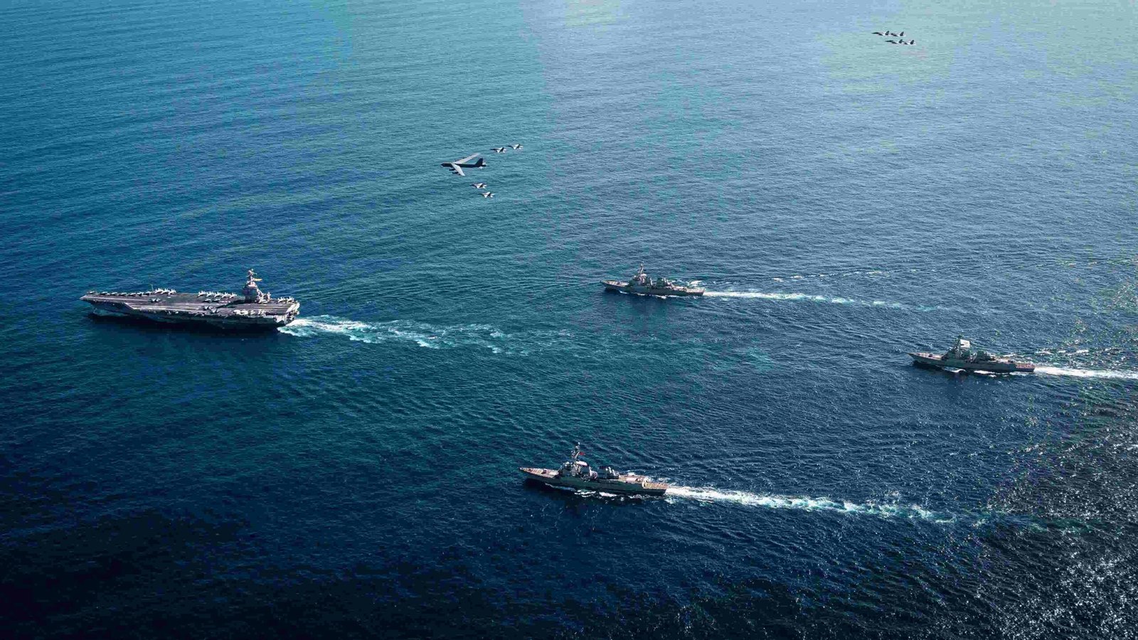 Former President Donald Trump at a political rally, discussing foreign policy