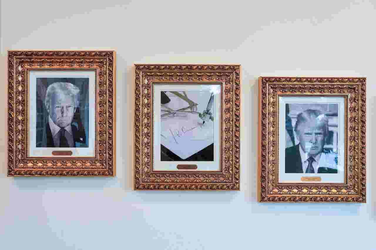 Donald Trump speaking at a rally, vowing to overturn Biden's executive orders.