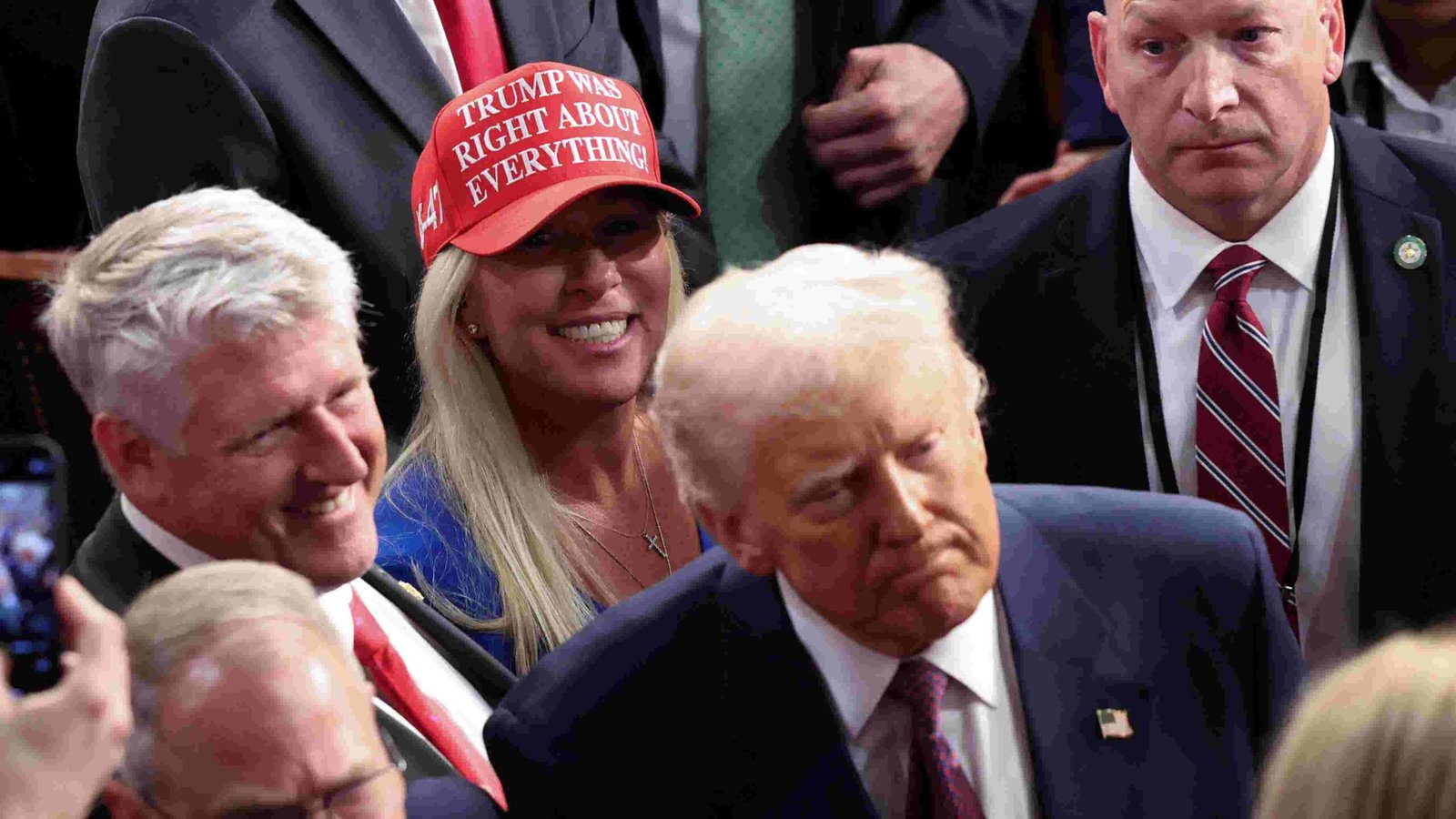 Donald Trump speaking at a rally, emphasizing his 'America First' agenda.