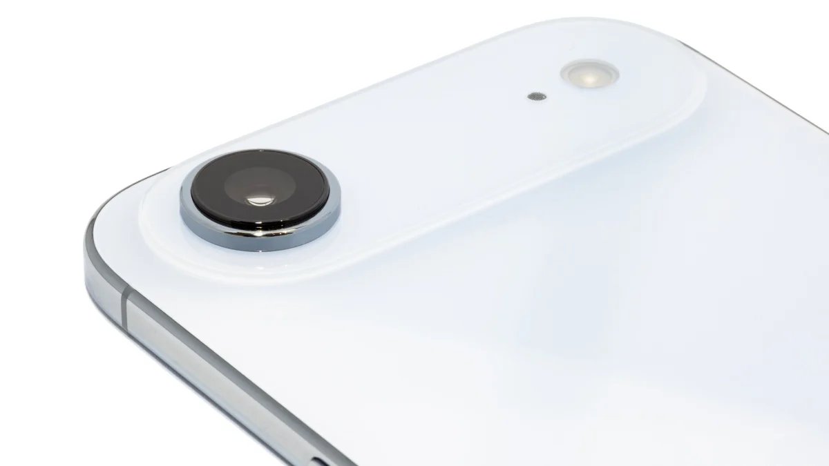 iPhone Air on a desk with design sketches