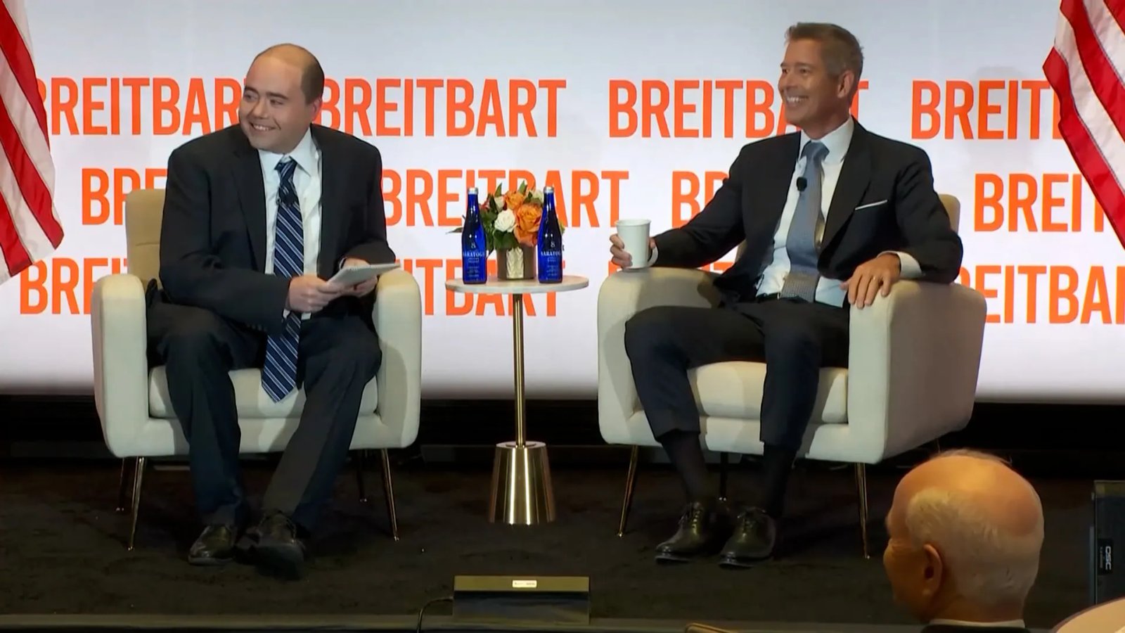 A busy airport security checkpoint, symbolizing the resumption of vital government services post-shutdown.