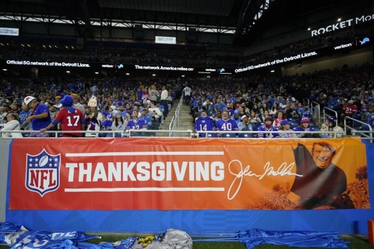Crowd Celebrating During a Halftime Show at a Thanksgiving Day Football Game