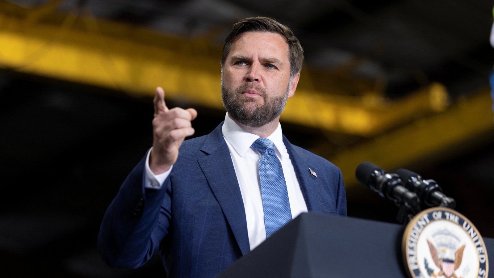 A close-up portrait of JD Vance, highlighting his thoughtful and determined expression.