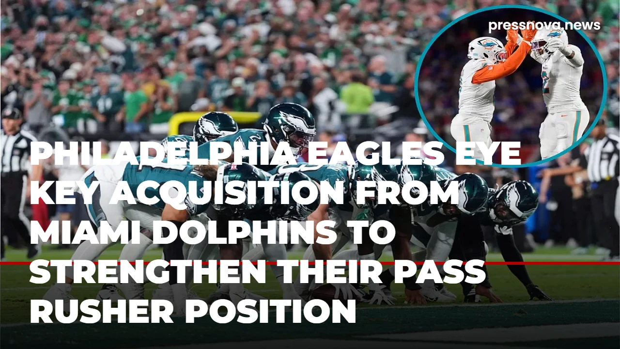 Philadelphia Eagles GM Howie Roseman observing practice, a key figure in the Eagles Dolphins trade rumors.