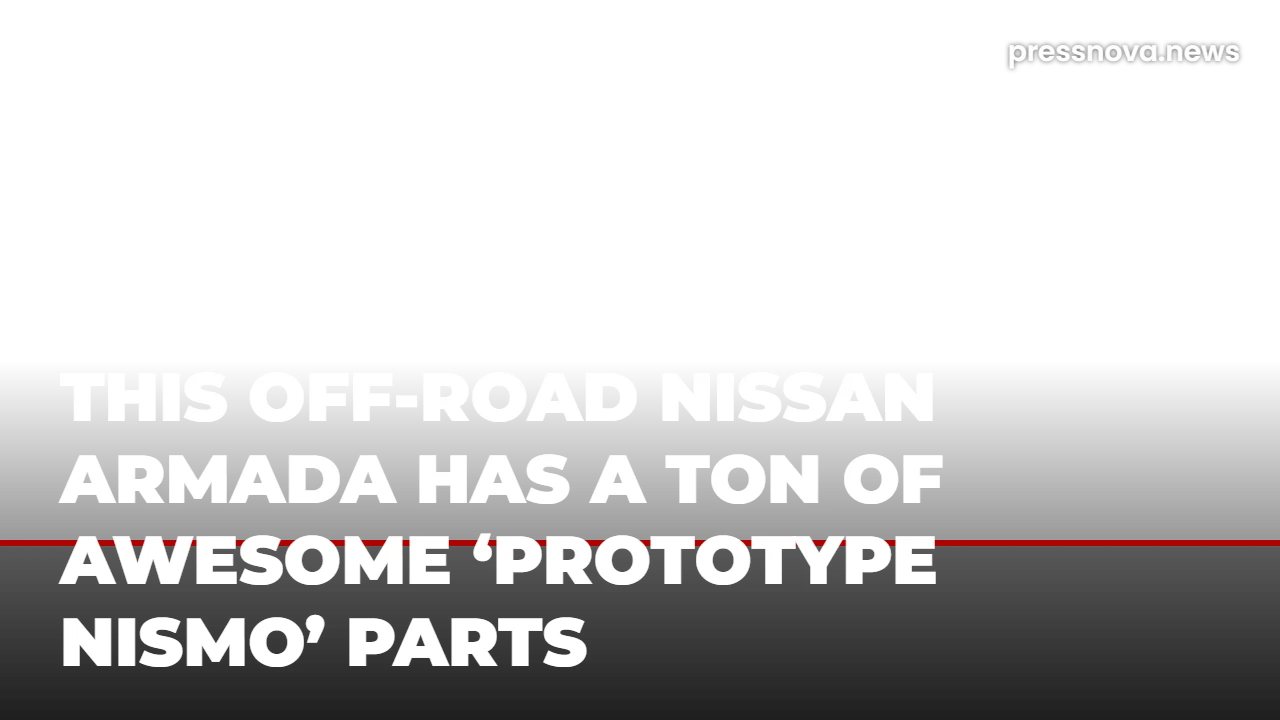 Rear view of the Nissan Armada Dune Patrol concept showing the spare tire carrier and MaxTrac traction boards.