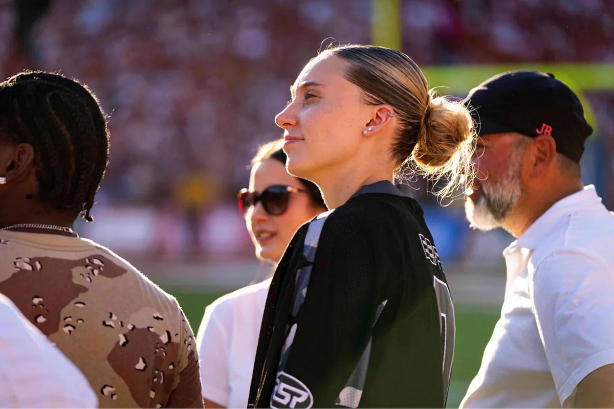 Paige Bueckers celebrating a basket during a UConn game.