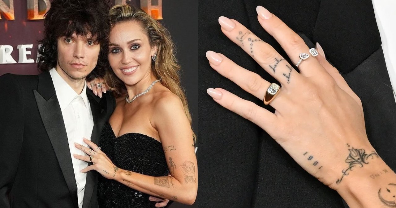 Close up of a hand with a large diamond ring, likely the engagement ring of Miley Cyrus and Maxx Morando