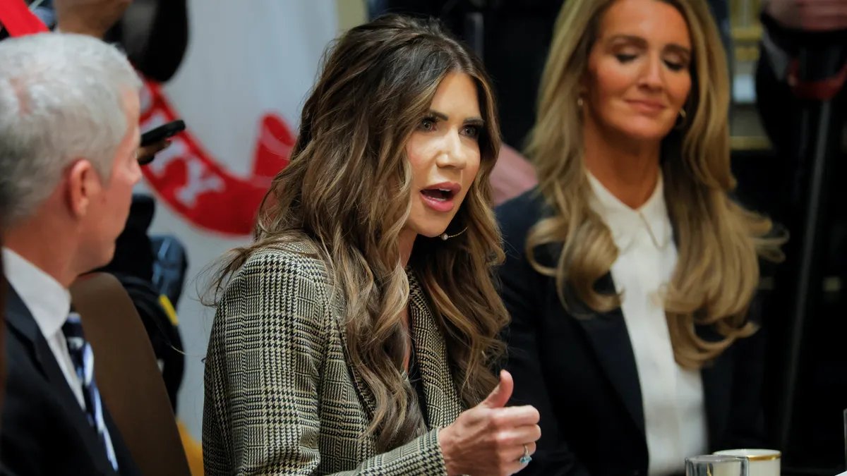 Kristi Noem speaking at a rally