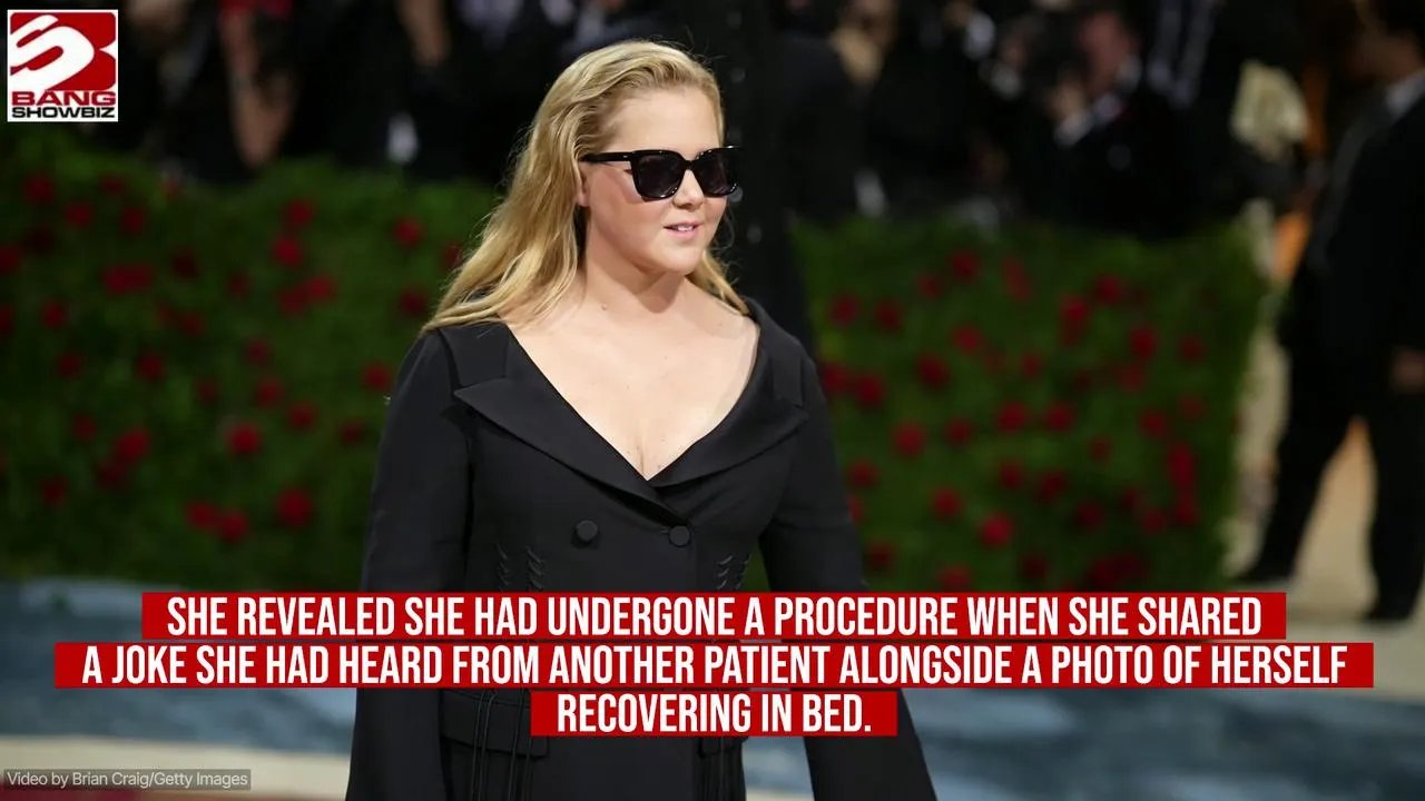 Close-up of Gene Fischer photobombing his mother Amy Schumer's Instagram photo. He is smiling, clearly enjoying the moment.