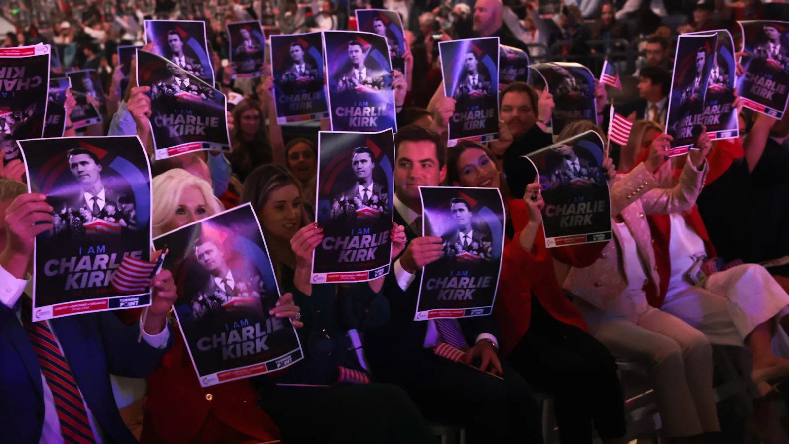 A student walking alone on a college campus path, head down, appearing contemplative or worried, amidst a backdrop of university buildings.