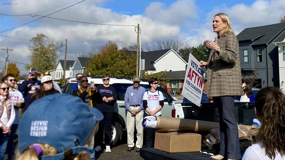 Aftyn Behn addressing a crowd at a political rally.