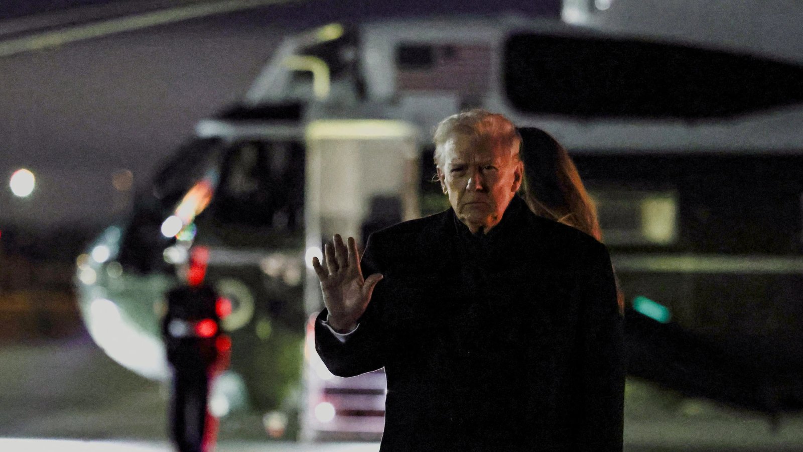 Jimmy Kimmel at the host desk laughing.