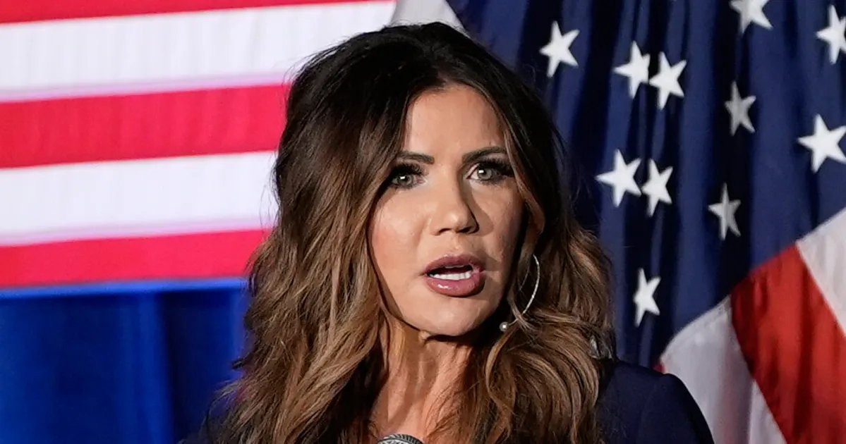 Kristi Noem speaking at a podium