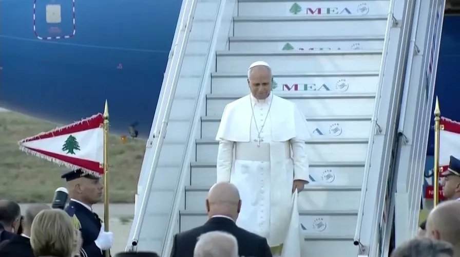 Close-up of Pope Leo XIV's dark blue suit.