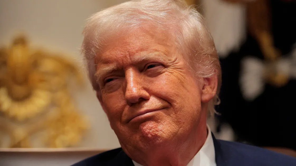 Donald Trump speaking at a rally, dismissing affordability concerns as a Democratic scam.