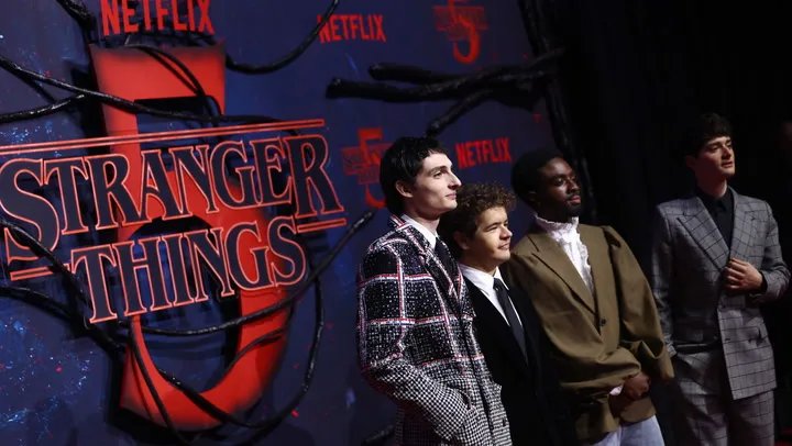 The core group of friends from Stranger Things, united against the forces of the Upside Down.