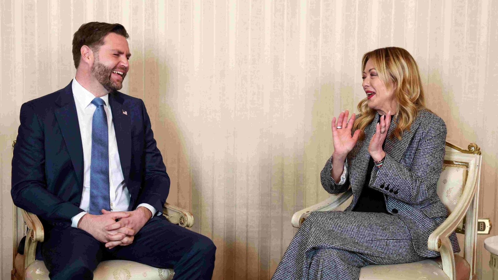 Vance and Italian Prime Minister engage in serious discussion before the Global Future Summit opening ceremony in Rome.
