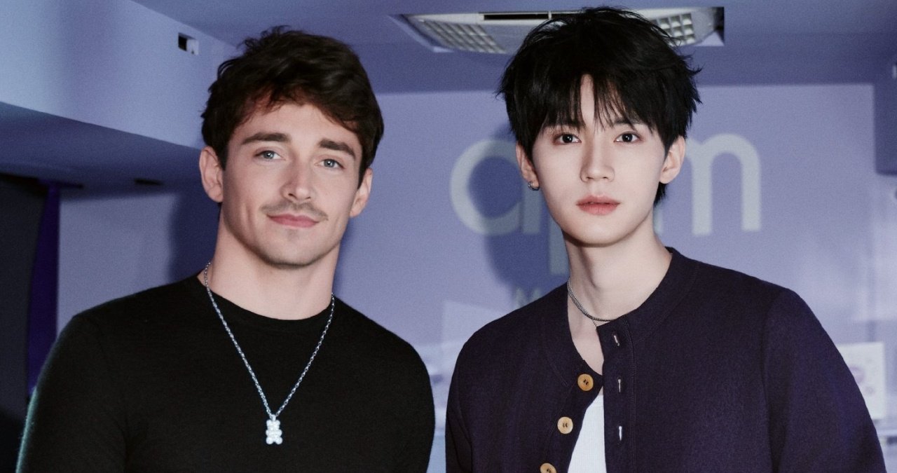 Zhou Yiran meeting Charles Leclerc with an excited expression