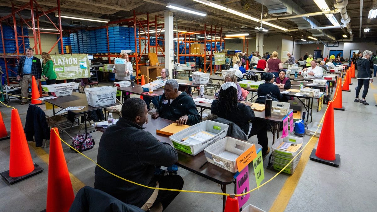 USPS mail ballot barcode tracking system explained showing envelope sorting process