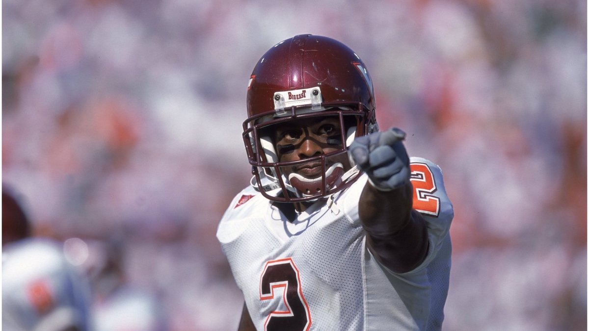 Virginia Tech Hokies football helmet with Lane Stadium in the background