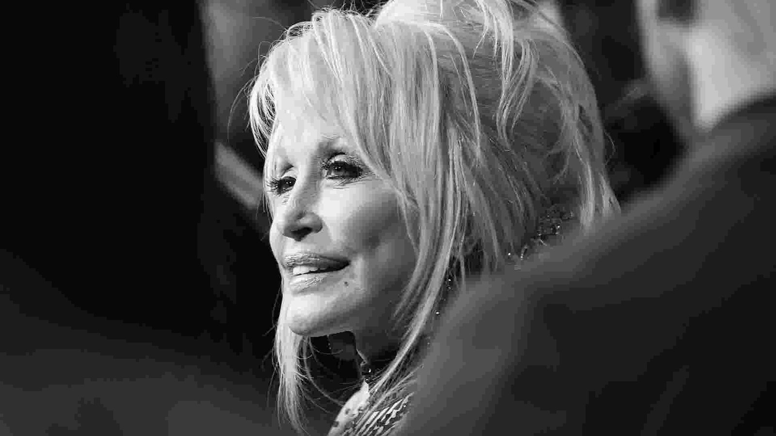 Dolly Parton donating books to children through Imagination Library program Dolly Parton donating books to children through Imagination Library program