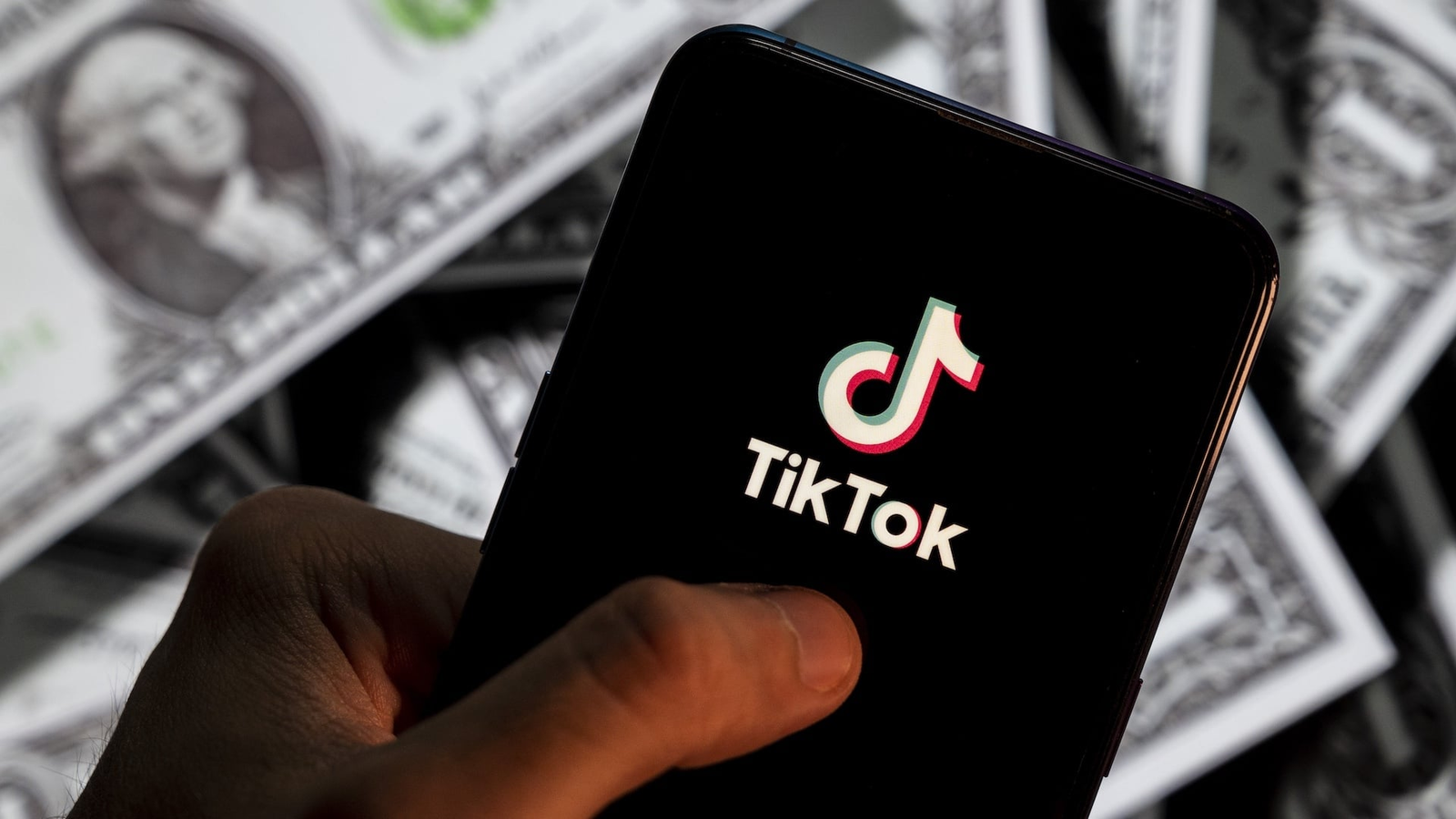 TikTok Pay logo and payment options interface on smartphone screen TikTok Pay logo and payment options interface on smartphone screen
