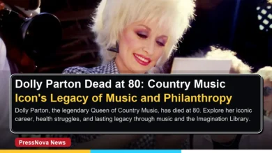 Dolly Parton smiling on stage performing country music in her signature style