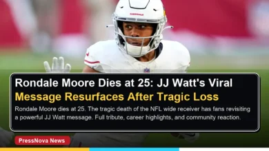 Rondale Moore in Arizona Cardinals uniform smiling on the field during a game